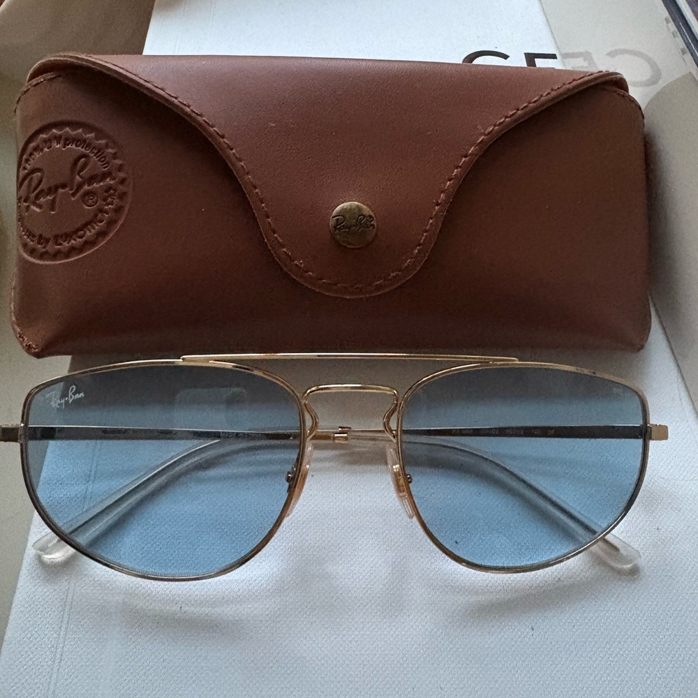 Ray-Ban Gold Frame Sunglasses with Light Blue Lenses